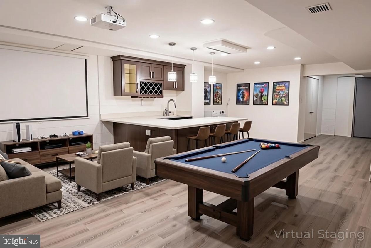 617 St Anthony Lane Upper Darby, PA 19082 - Photo 21 of 26 a room with furniture pool table flat screen tv and couches
