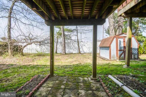 a view of a porch with a yard