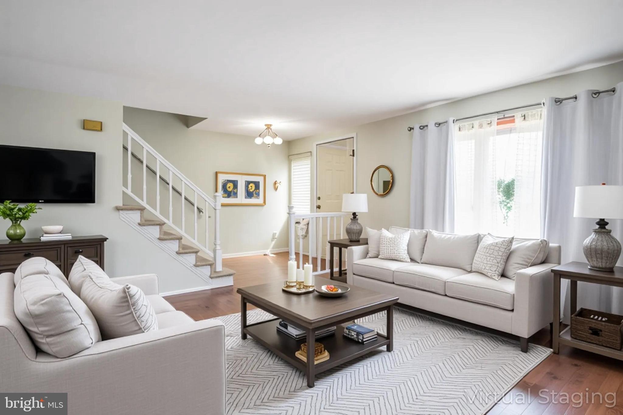 617 St Anthony Lane Upper Darby, PA 19082 - Photo 3 of 26 a living room with furniture and a flat screen tv