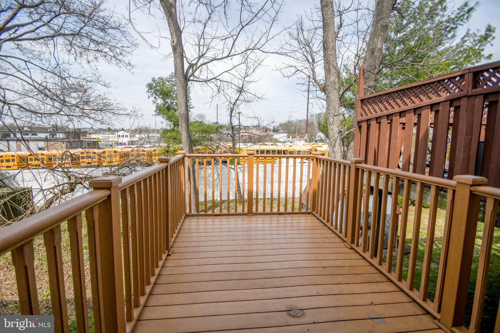 617 St Anthony Lane Upper Darby, PA 19082 - Photo 9 of 26 a view of a balcony with wooden floor and fence