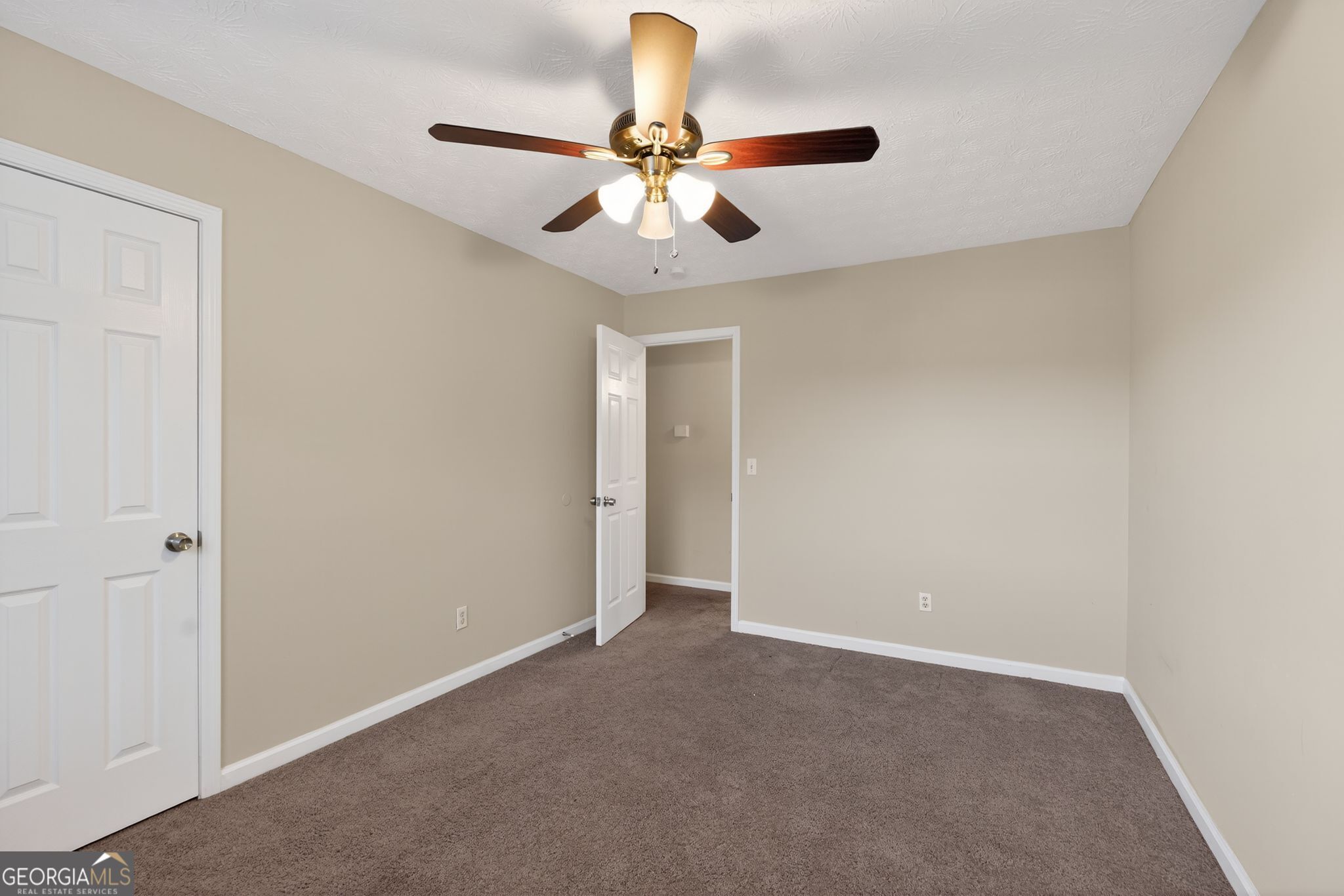 6463 Castle Ct Way Lithonia, GA 30058 - Photo 19 of 35 a view of an empty room with a window