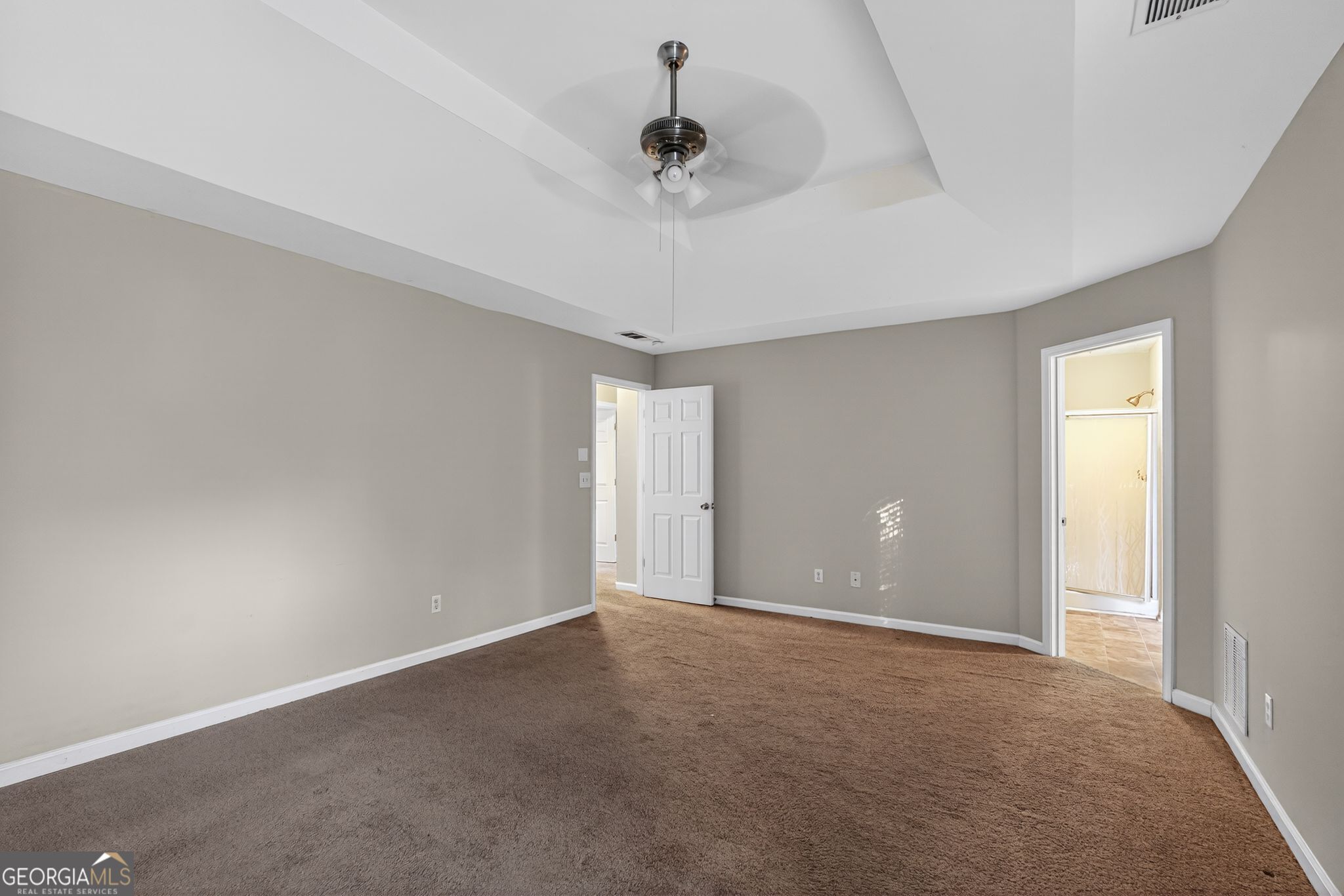6463 Castle Ct Way Lithonia, GA 30058 - Photo 20 of 35 a view of an empty room and a window