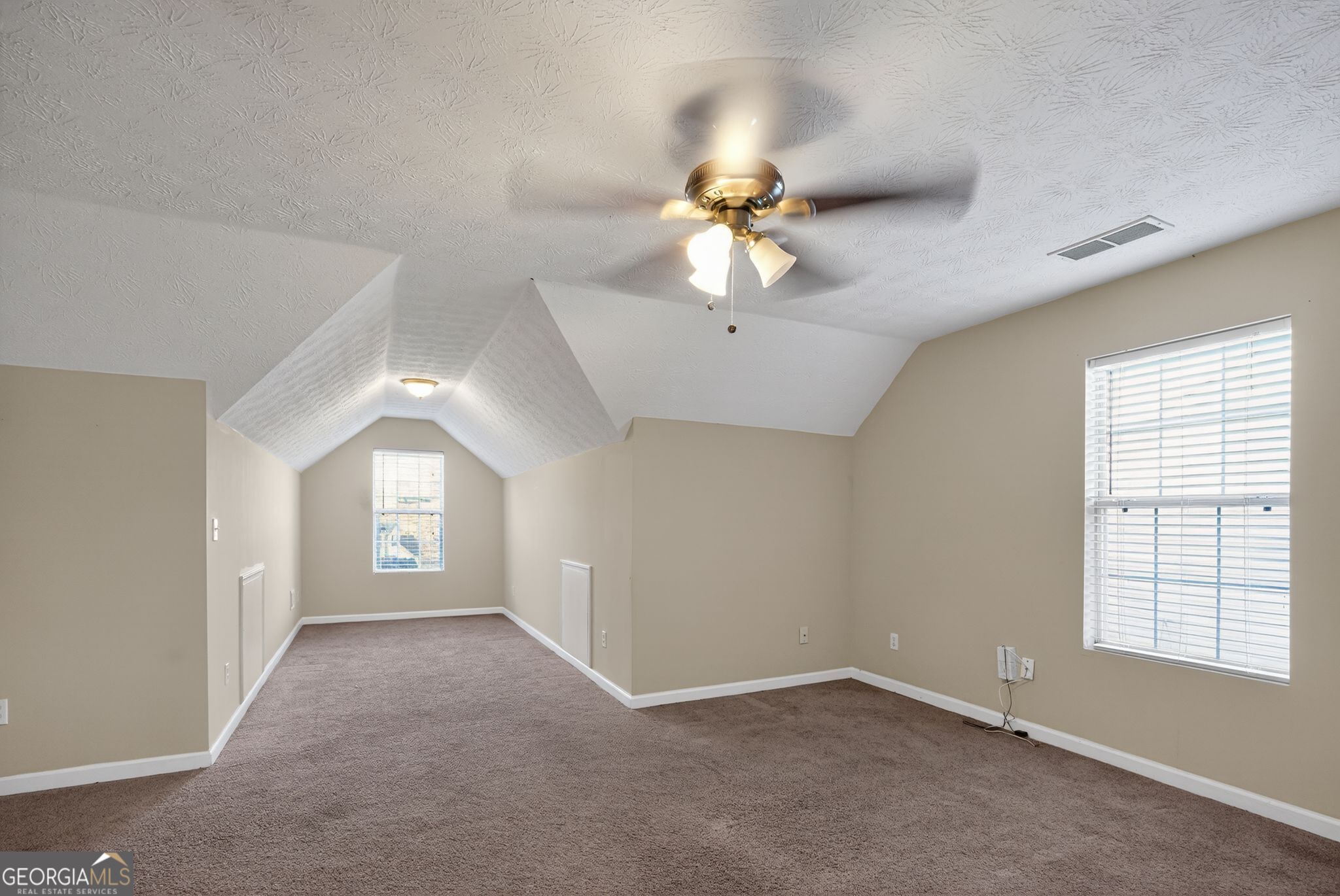 6463 Castle Ct Way Lithonia, GA 30058 - Photo 27 of 35 a view of an empty room with a window