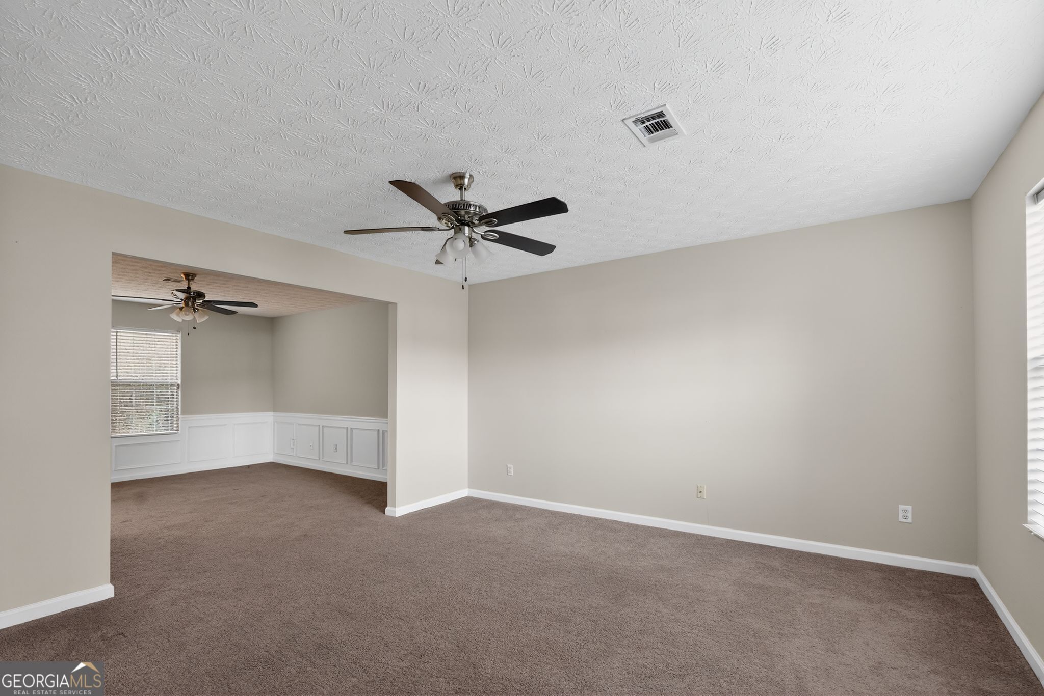 6463 Castle Ct Way Lithonia, GA 30058 - Photo 3 of 35 a view of an empty room