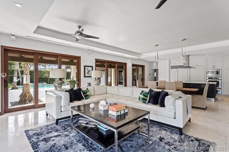 1047 Mariner Drive Key Biscayne, FL 33149 - Photo 10 of 15 a living room with furniture and a rug