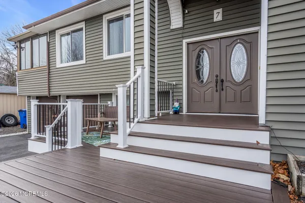 a front view of a house with a porch