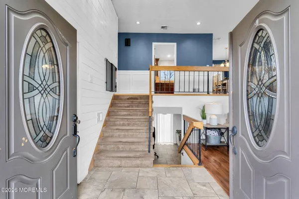 a view of an entryway with a livingroom