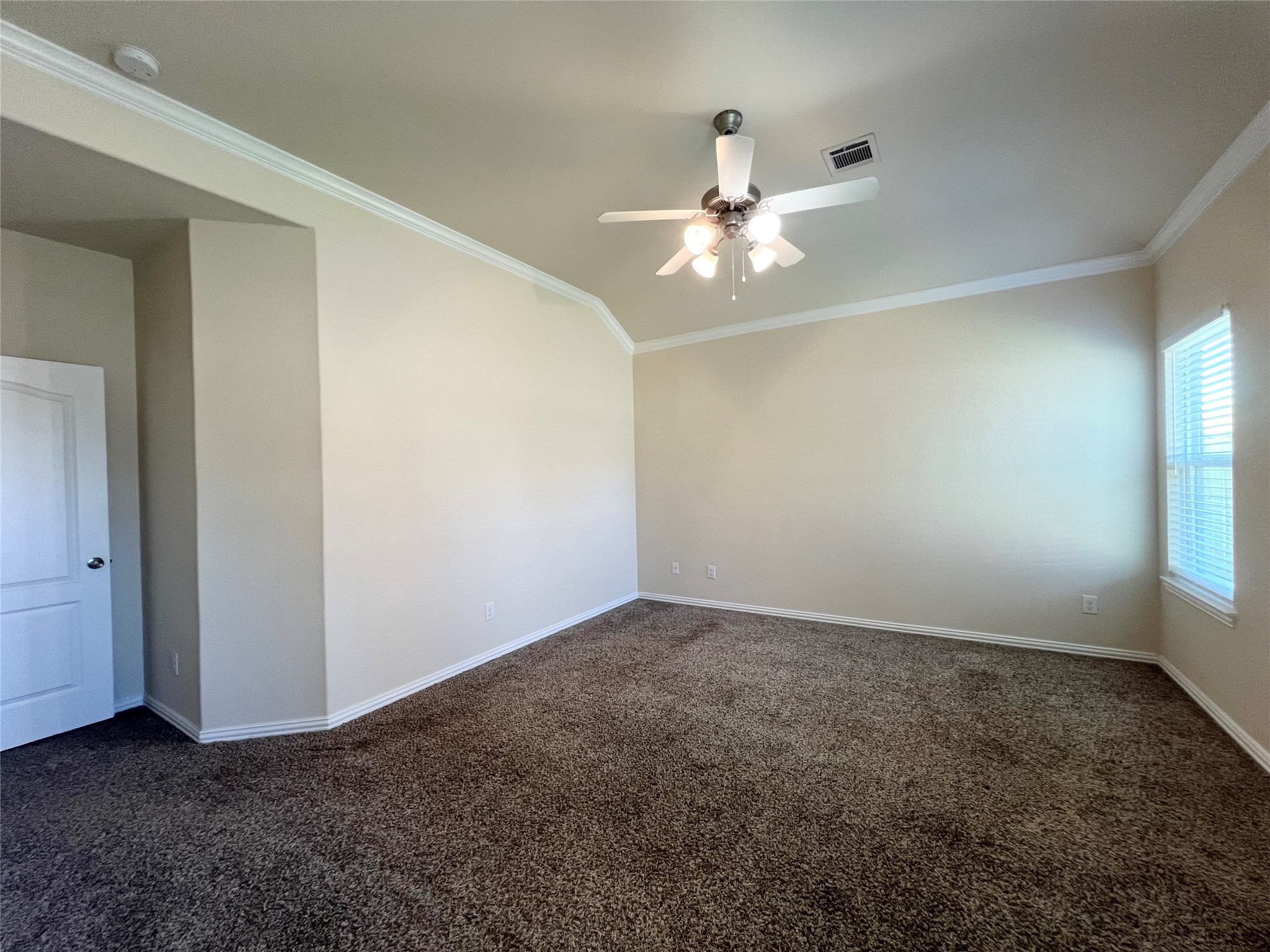 1507 Bella Garden Spring, TX 77373 - Photo 11 of 22 an empty room with windows and fan