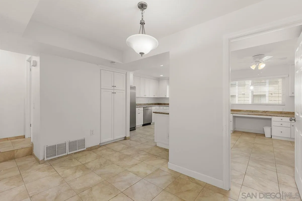 4028 Mahaila Avenue, Unit C San Diego, CA 92122 - Photo 11 of 34 a view of a kitchen and a windows