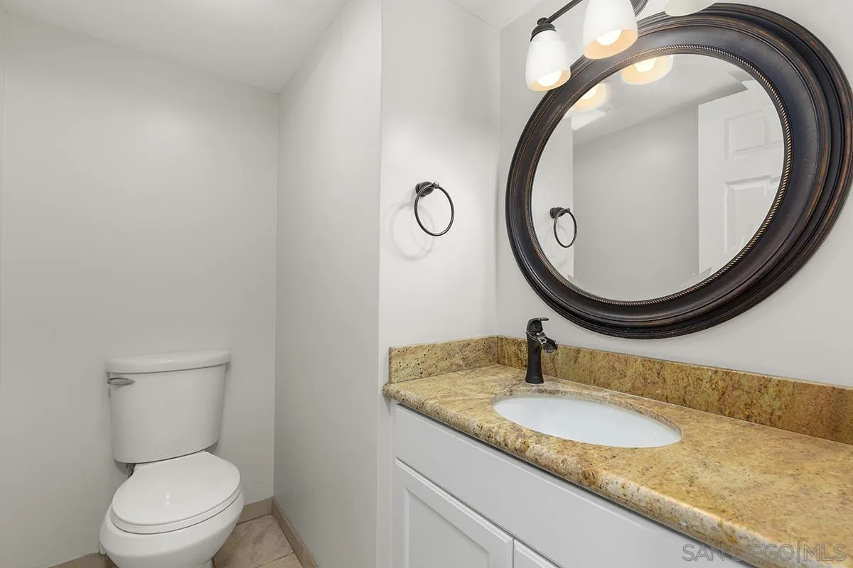 4028 Mahaila Avenue, Unit C San Diego, CA 92122 - Photo 17 of 34 a bathroom with a toilet and a sink