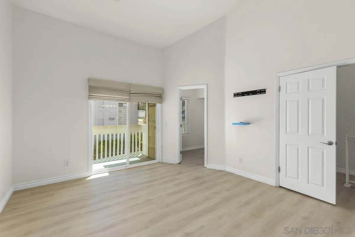 4028 Mahaila Avenue, Unit C San Diego, CA 92122 - Photo 18 of 34 a view of entryway with wooden floor