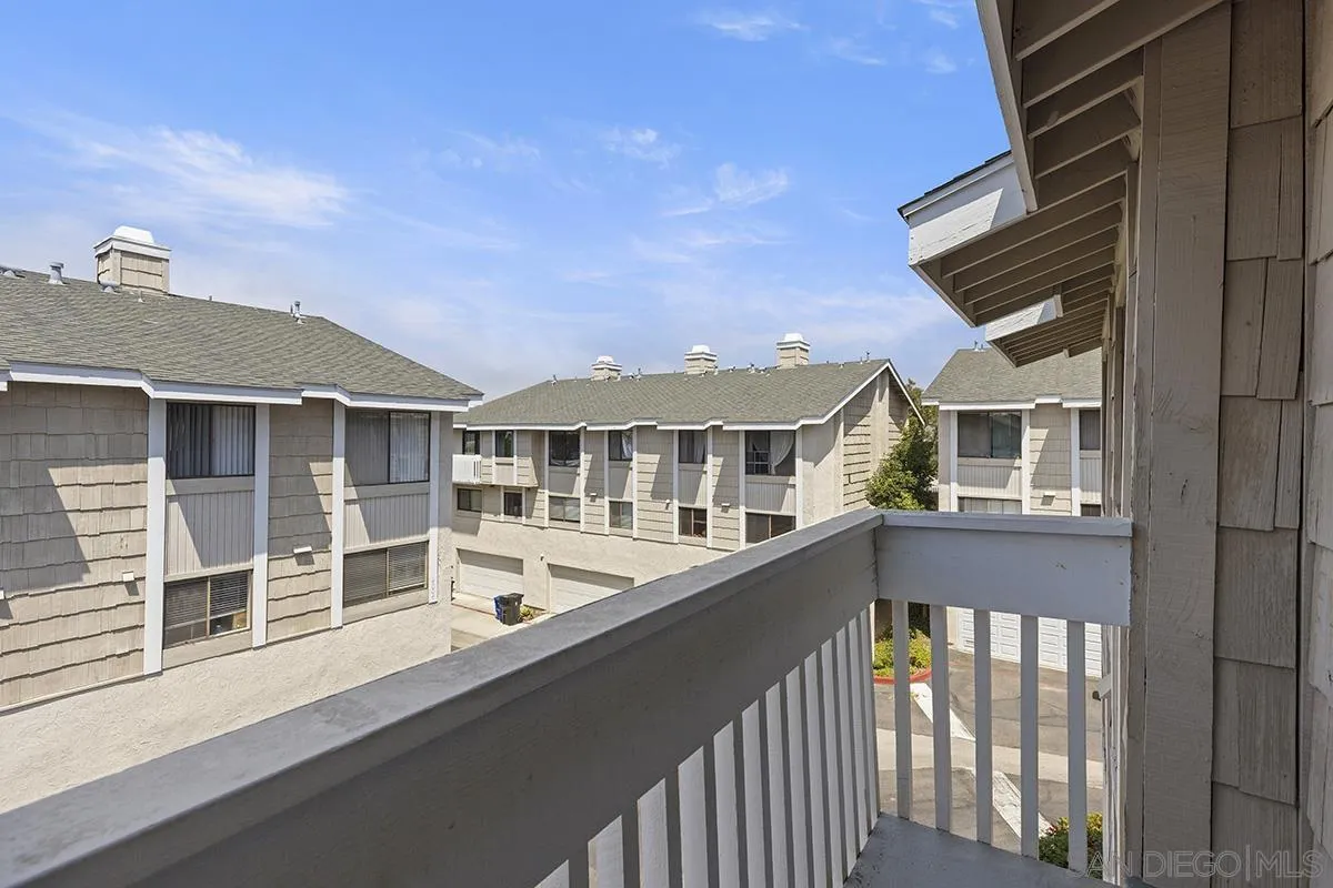 4028 Mahaila Avenue, Unit C San Diego, CA 92122 - Photo 25 of 34 a front view of a house with large windows