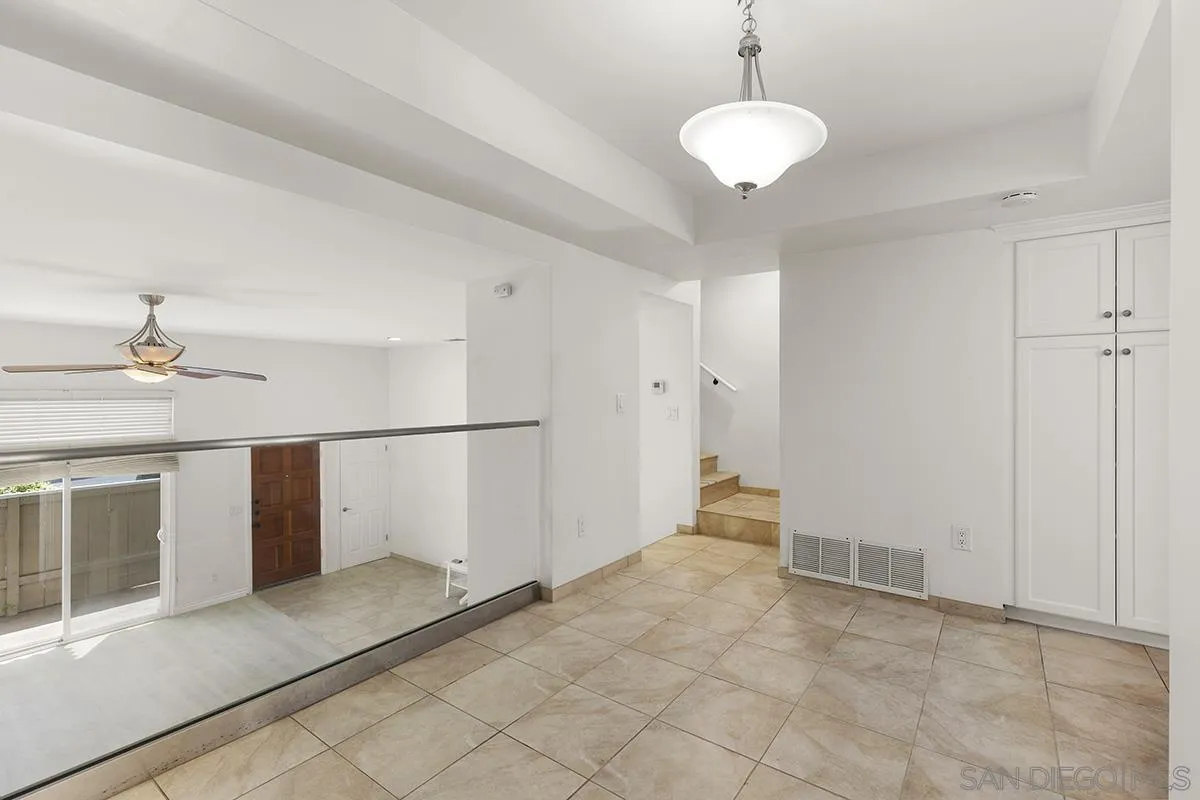 4028 Mahaila Avenue, Unit C San Diego, CA 92122 - Photo 10 of 34 a view of an empty room with a window