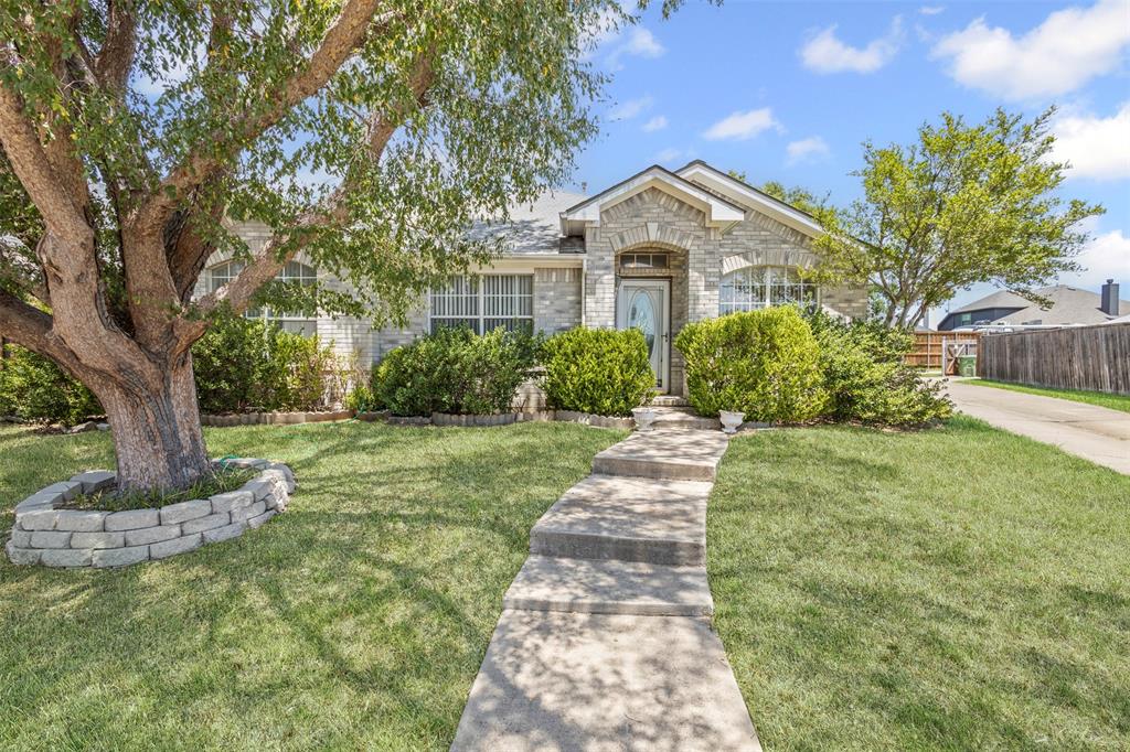 4532 Rustic Ridge Court The Colony, TX 75056 - Photo 1 of 1 View of front facade with brick siding and stone siding