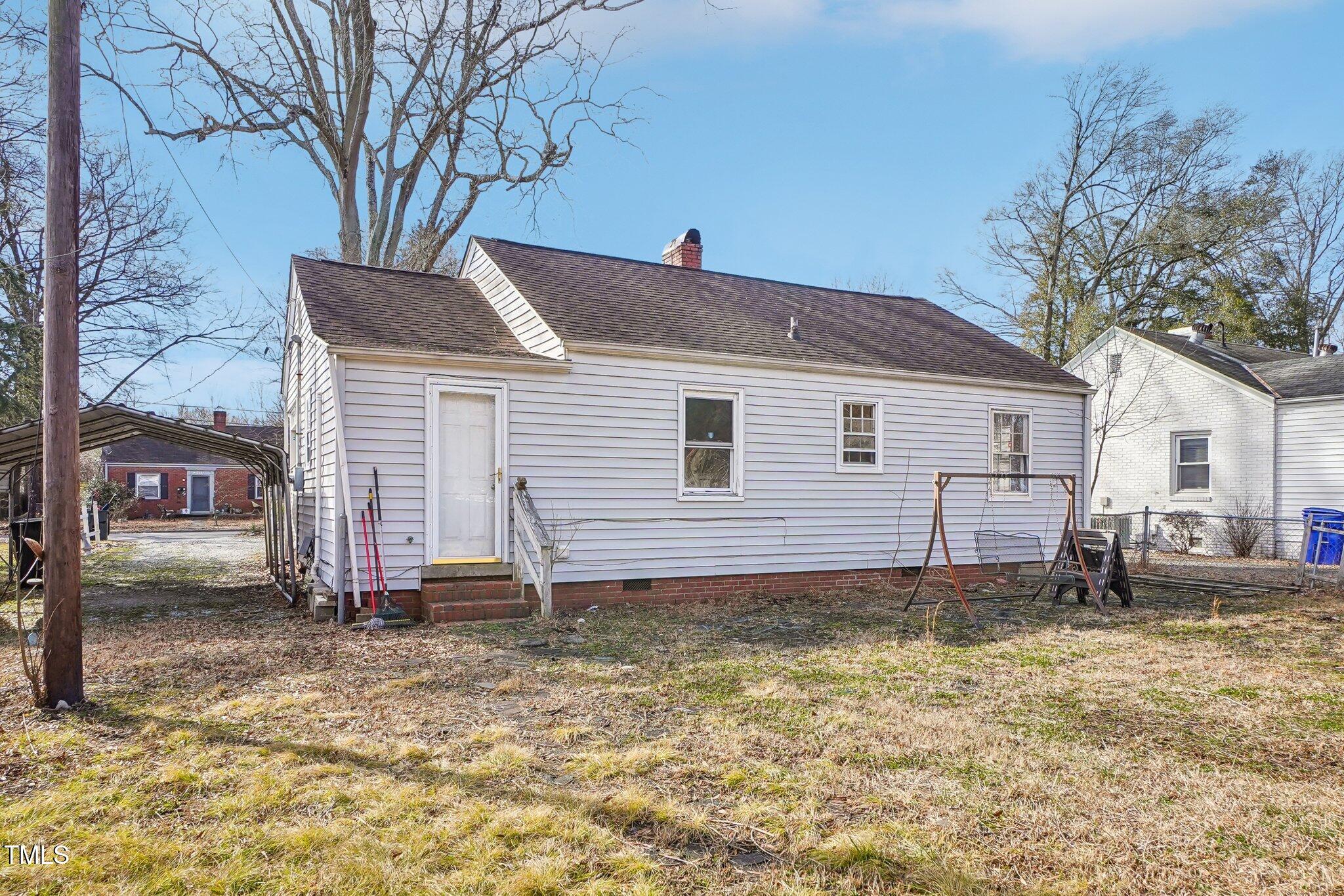 115 Higbee Street Durham, NC 27704 - Photo 13 of 14 a view of a house with a yard