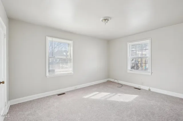 an empty room with a window