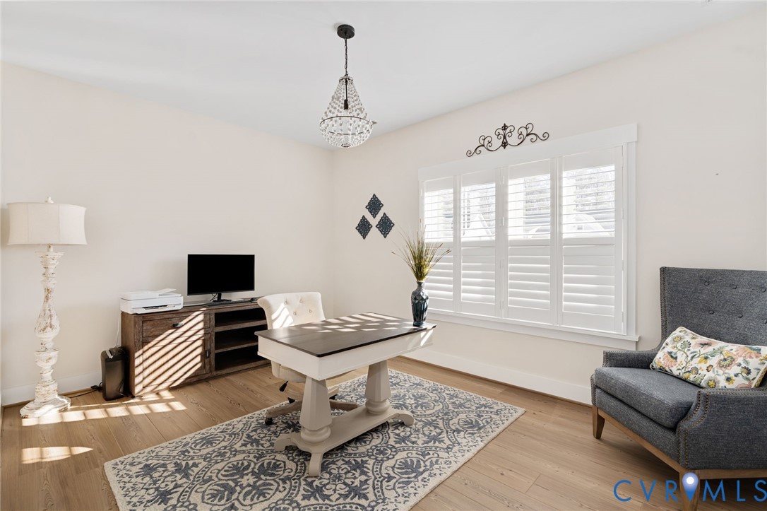8614 Terroir Lane New Kent, VA 23124 - Photo 23 of 42 a living room with furniture and a window