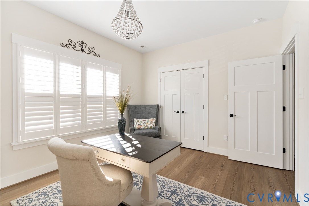 8614 Terroir Lane New Kent, VA 23124 - Photo 24 of 42 a living room with furniture and a window