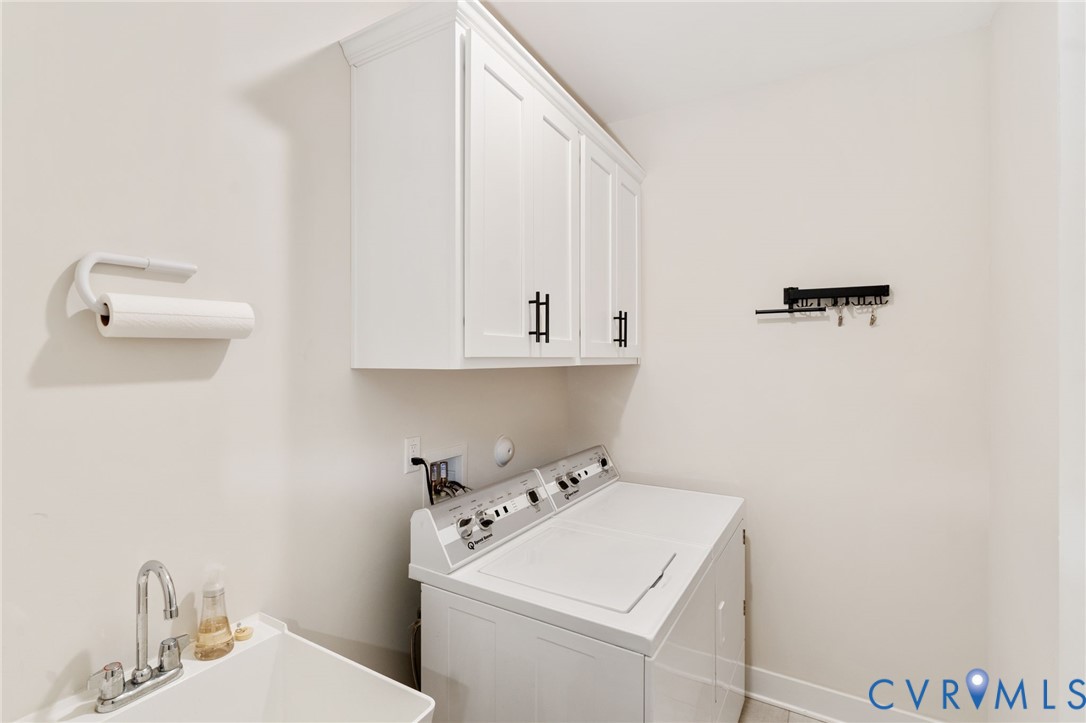 8614 Terroir Lane New Kent, VA 23124 - Photo 32 of 42 a utility room with dryer and washer