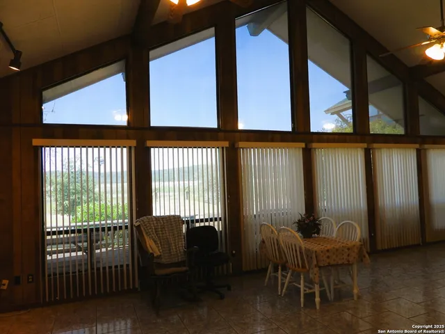 a view of balcony with furniture