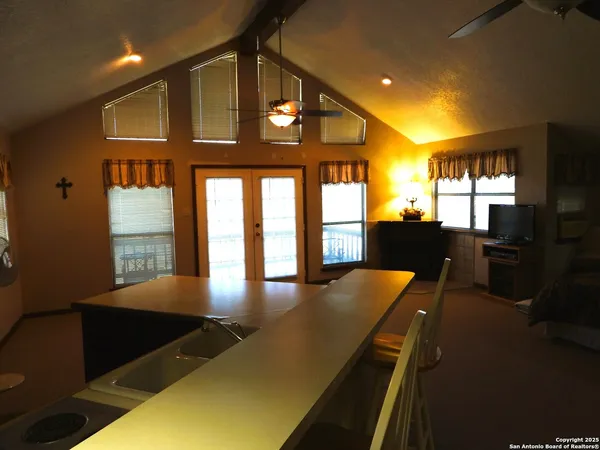 a view of a living room and dining room