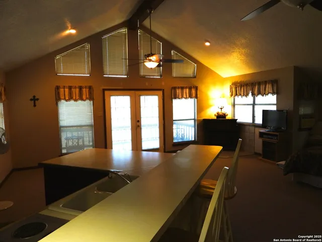 a view of a living room and dining room