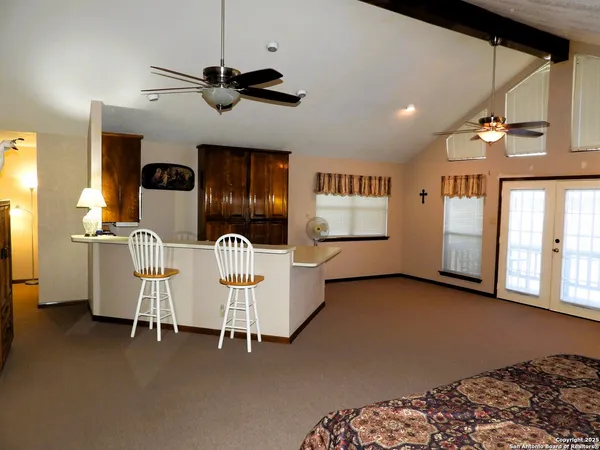 a living room with furniture and window