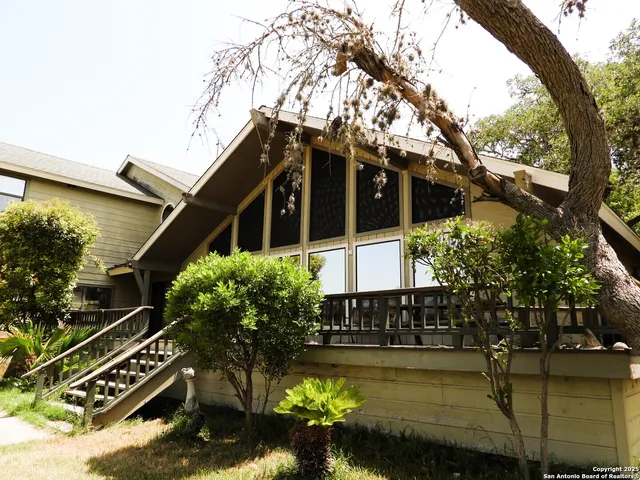 a front view of a house with swimming pool