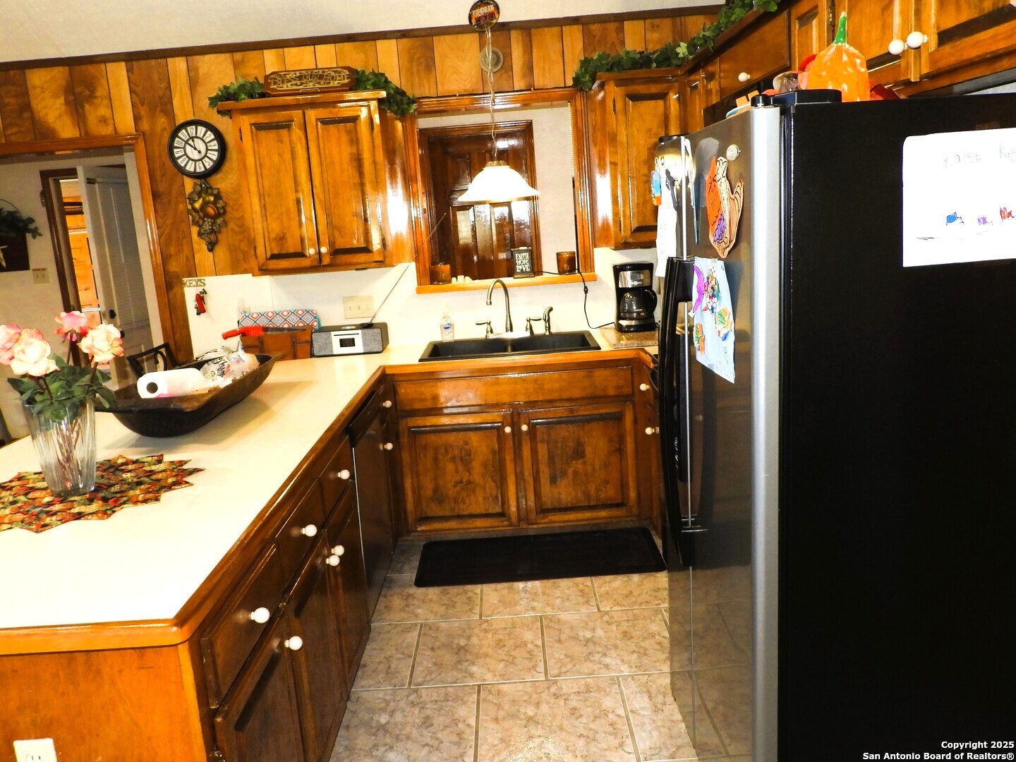 3078 Goat Hill Road Lakehills, TX 78063 - Photo 10 of 38 a kitchen with stainless steel appliances a sink and a stove
