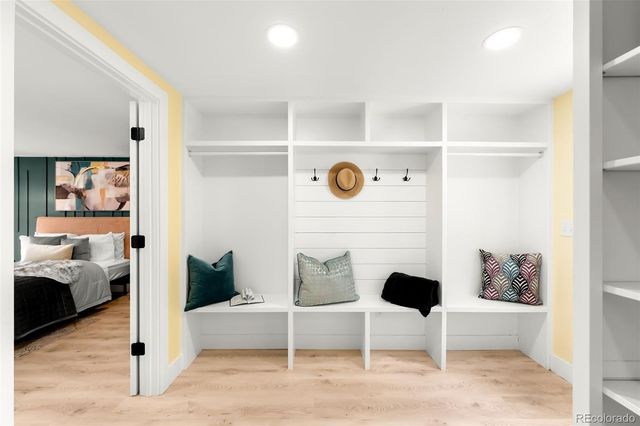 a view of livingroom with furniture and cabinet