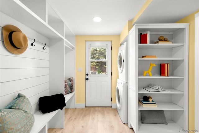 a view of hallway with washer and dryer