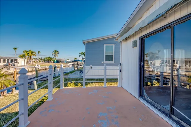 a view of a swimming pool with a balcony