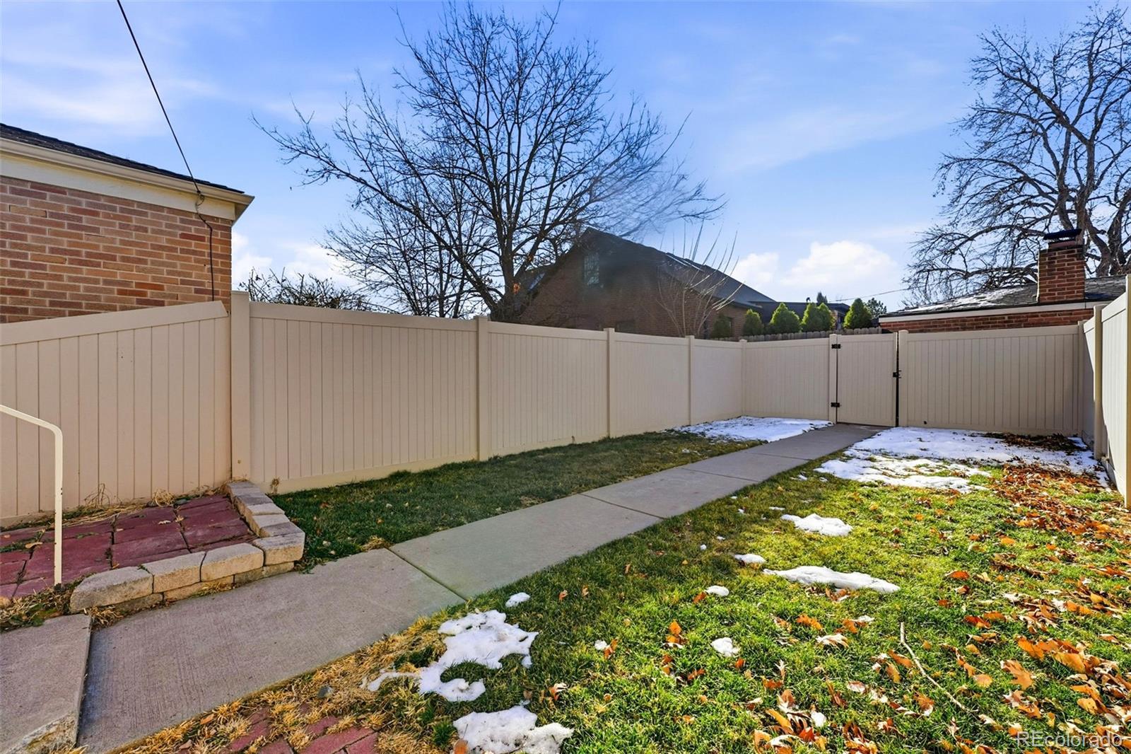 781 Forest Street Denver, CO 80220 - Photo 14 of 19 a backyard of a house
