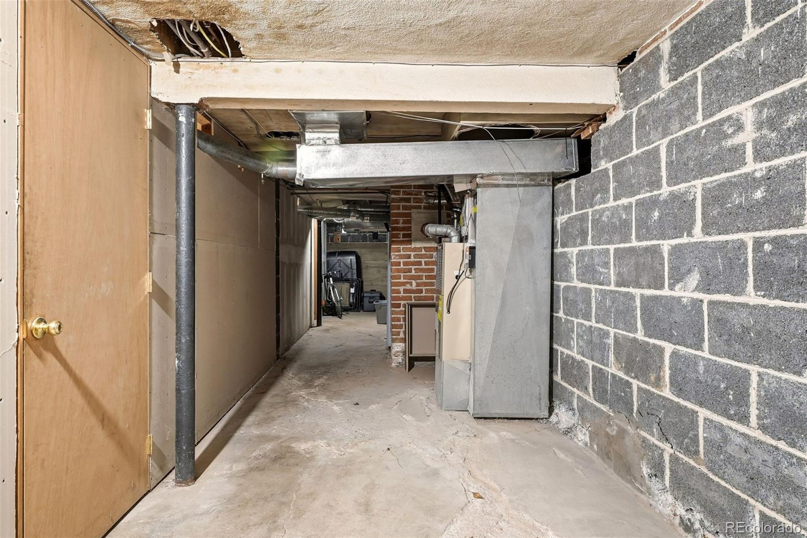 781 Forest Street Denver, CO 80220 - Photo 16 of 19 a view of a storage & utility room