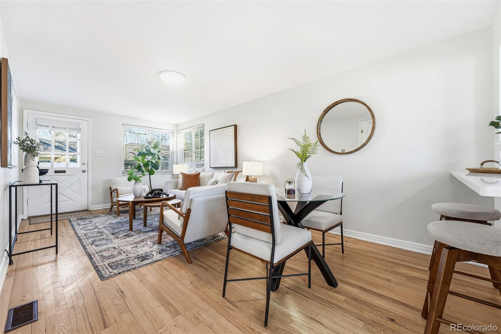 781 Forest Street Denver, CO 80220 - Photo 3 of 19 a living room with furniture and wooden floor