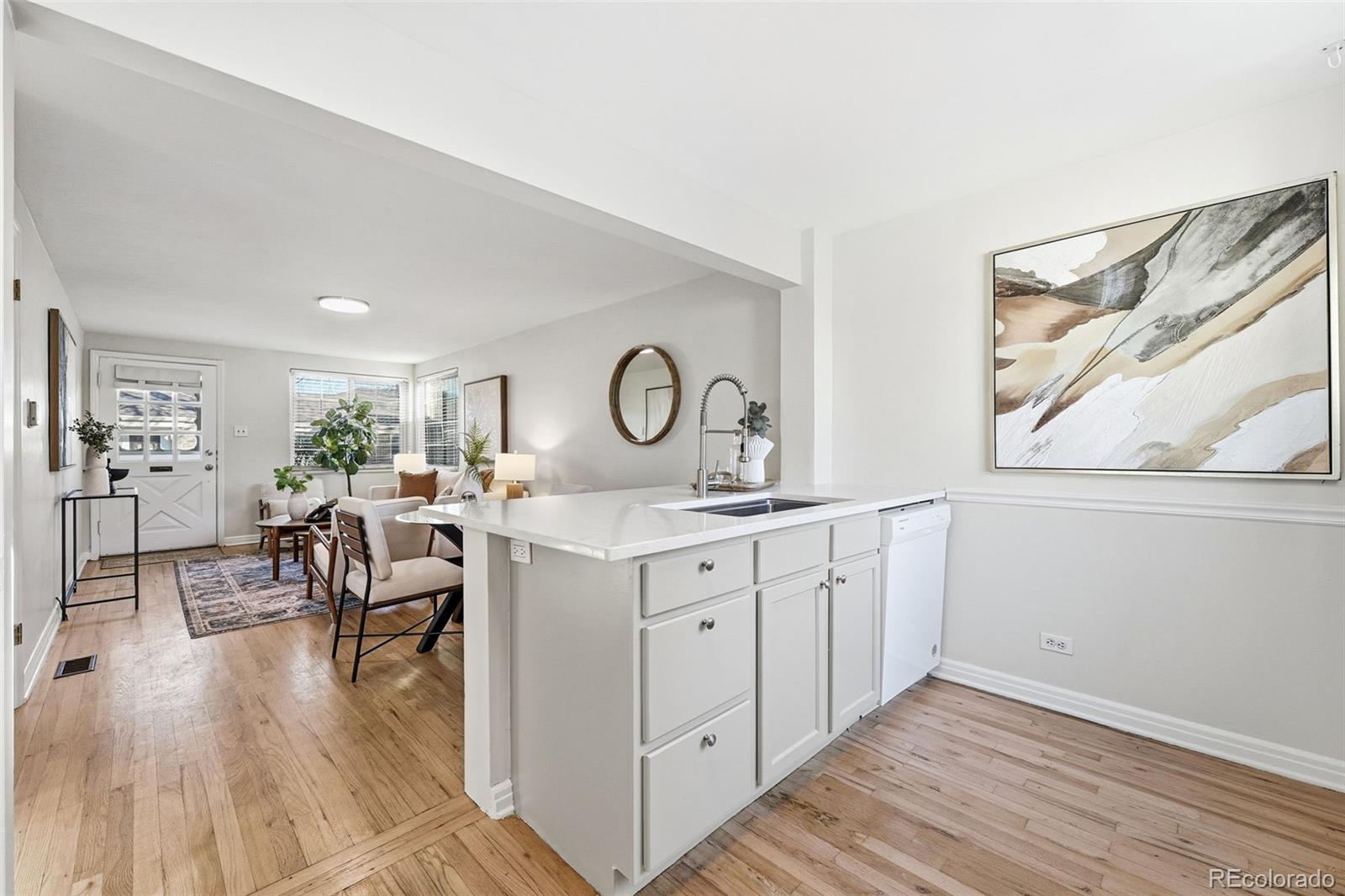 781 Forest Street Denver, CO 80220 - Photo 6 of 19 a kitchen with sink and cabinets