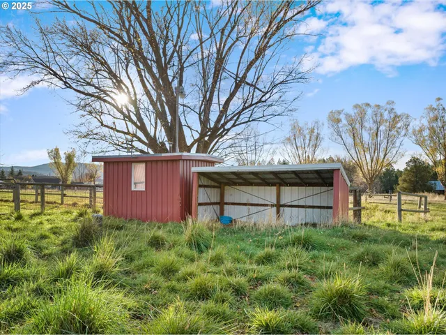 a view of swimming pool with an outdoor space and seating area