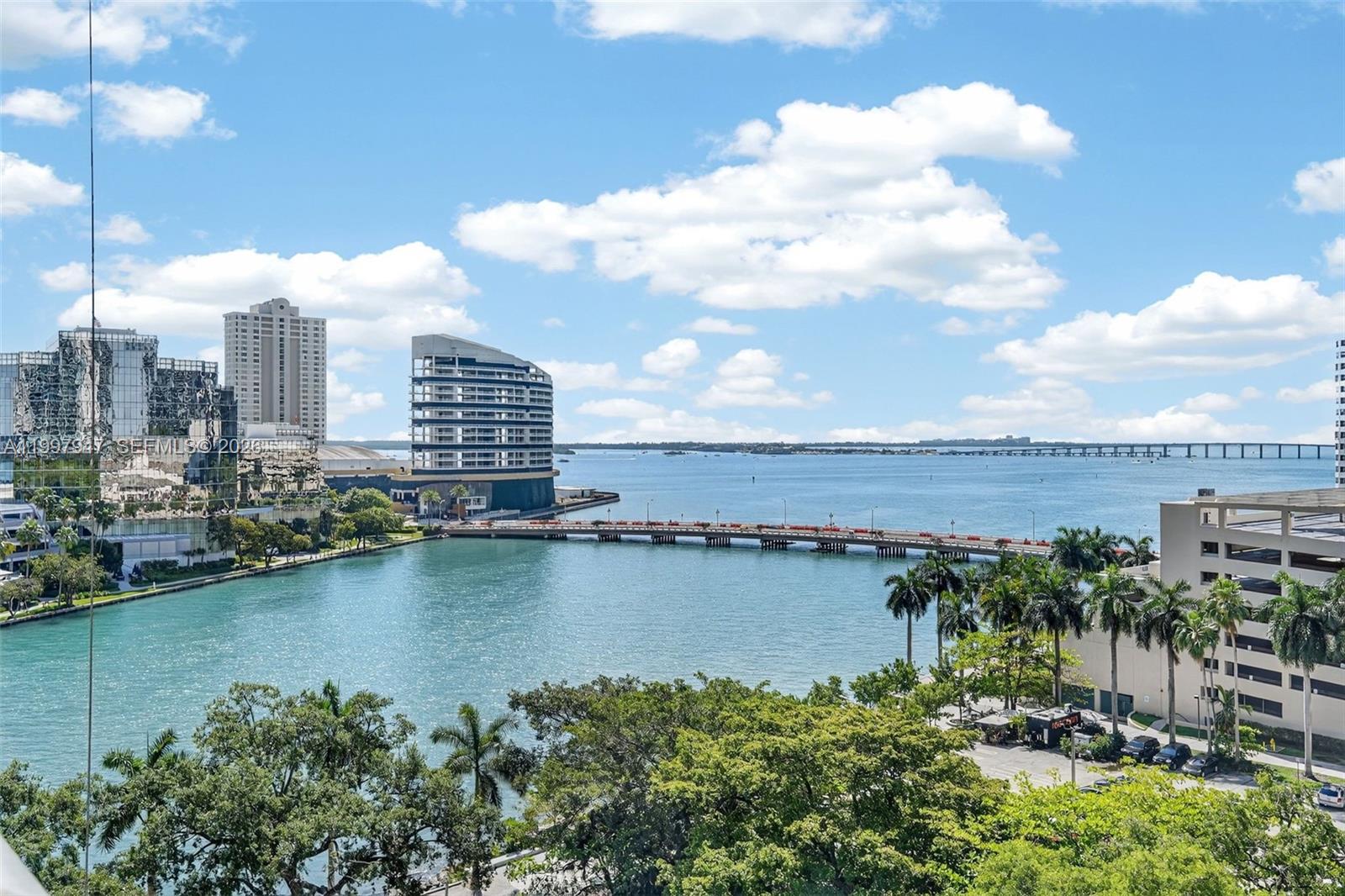 495 Brickell Avenue, Unit 1007 Miami, FL 33131 - Photo 11 of 17 a view of a city with a lake