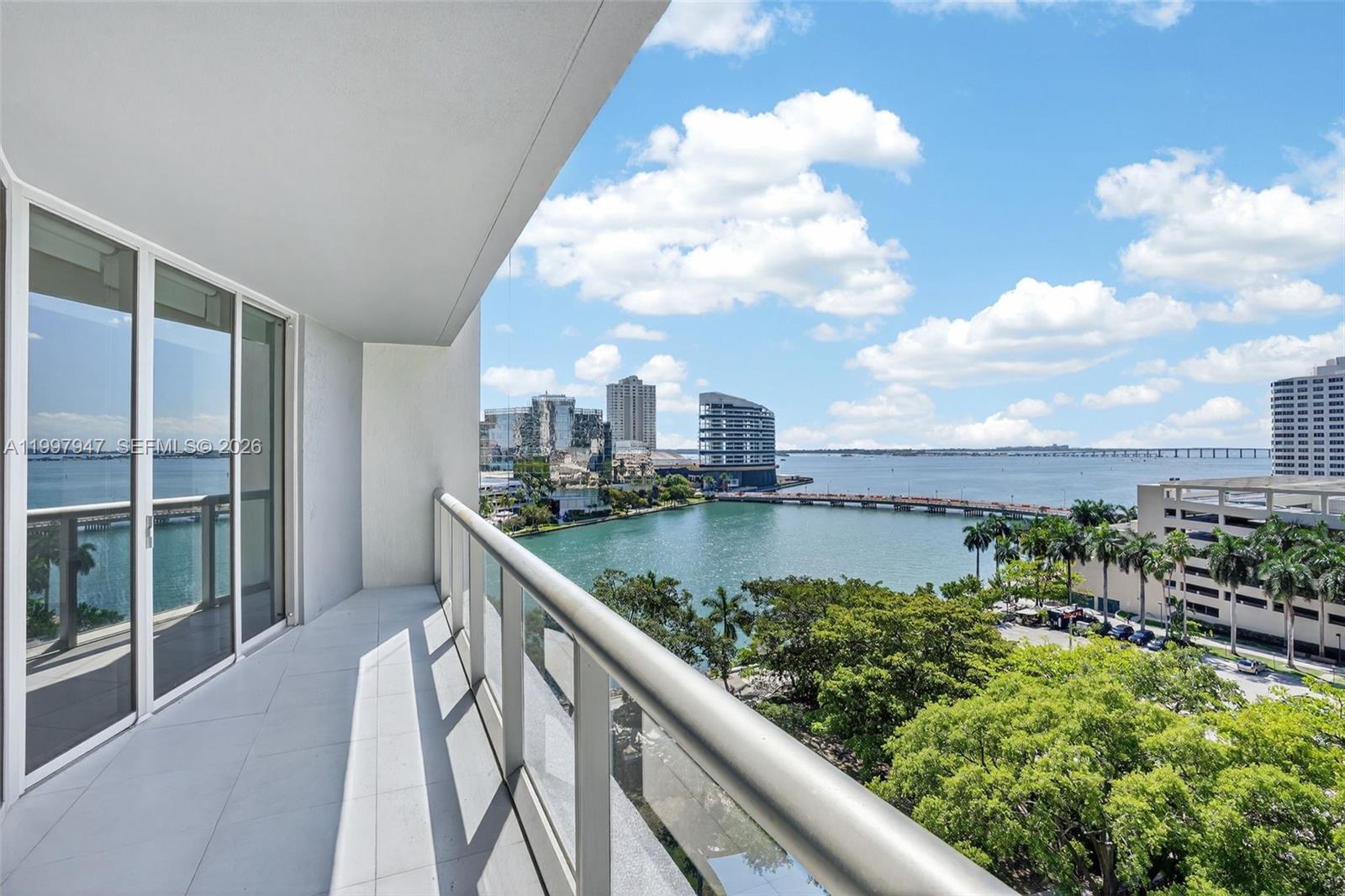 495 Brickell Avenue, Unit 1007 Miami, FL 33131 - Photo 10 of 17 a view of a lake from a balcony