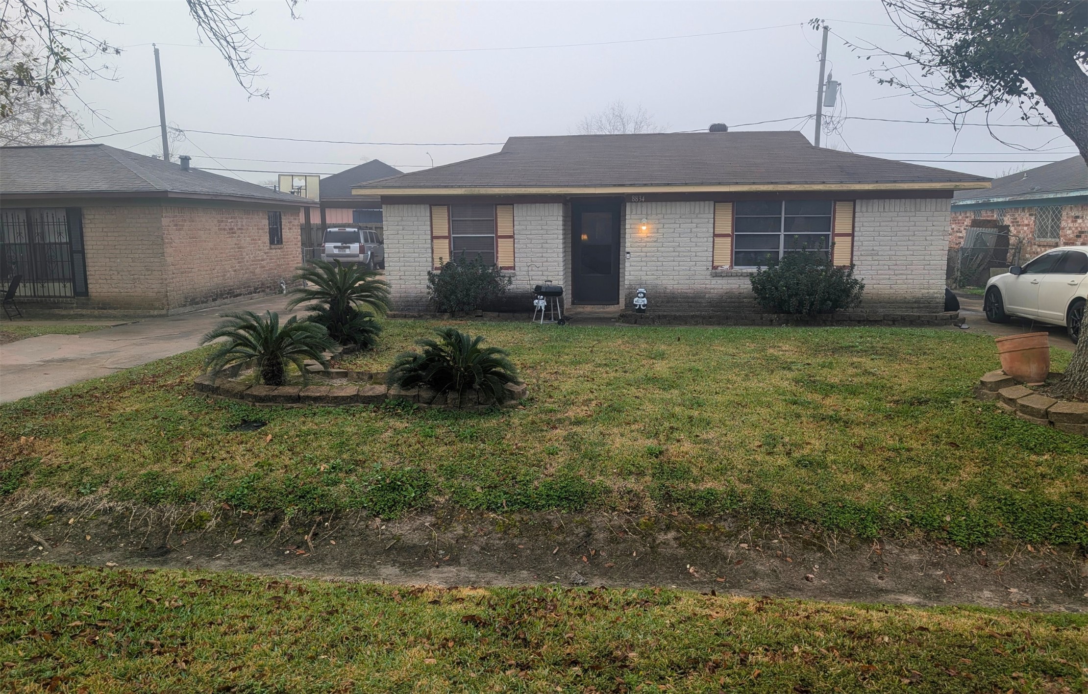 8834 Judwin Street Houston, TX 77075 - Photo 2 of 6 a front view of a house with garden