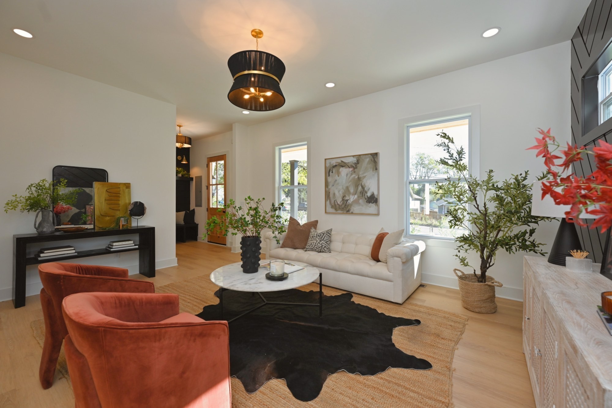 1212 Stockell Street Nashville, TN 37207 - Photo 14 of 86 a living room with furniture kitchen and a chandelier