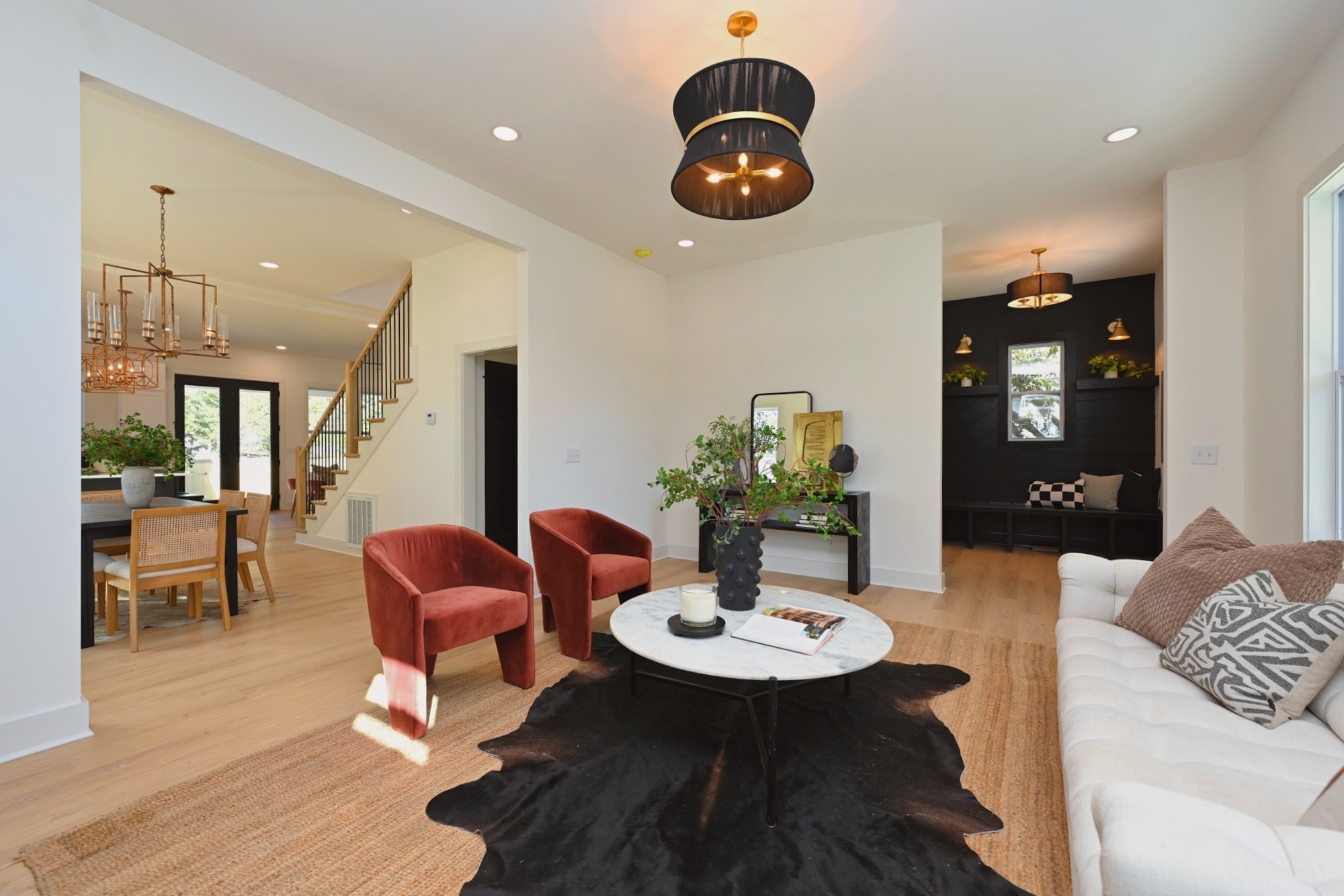 1212 Stockell Street Nashville, TN 37207 - Photo 15 of 86 a view of a dining room with furniture and wooden floor