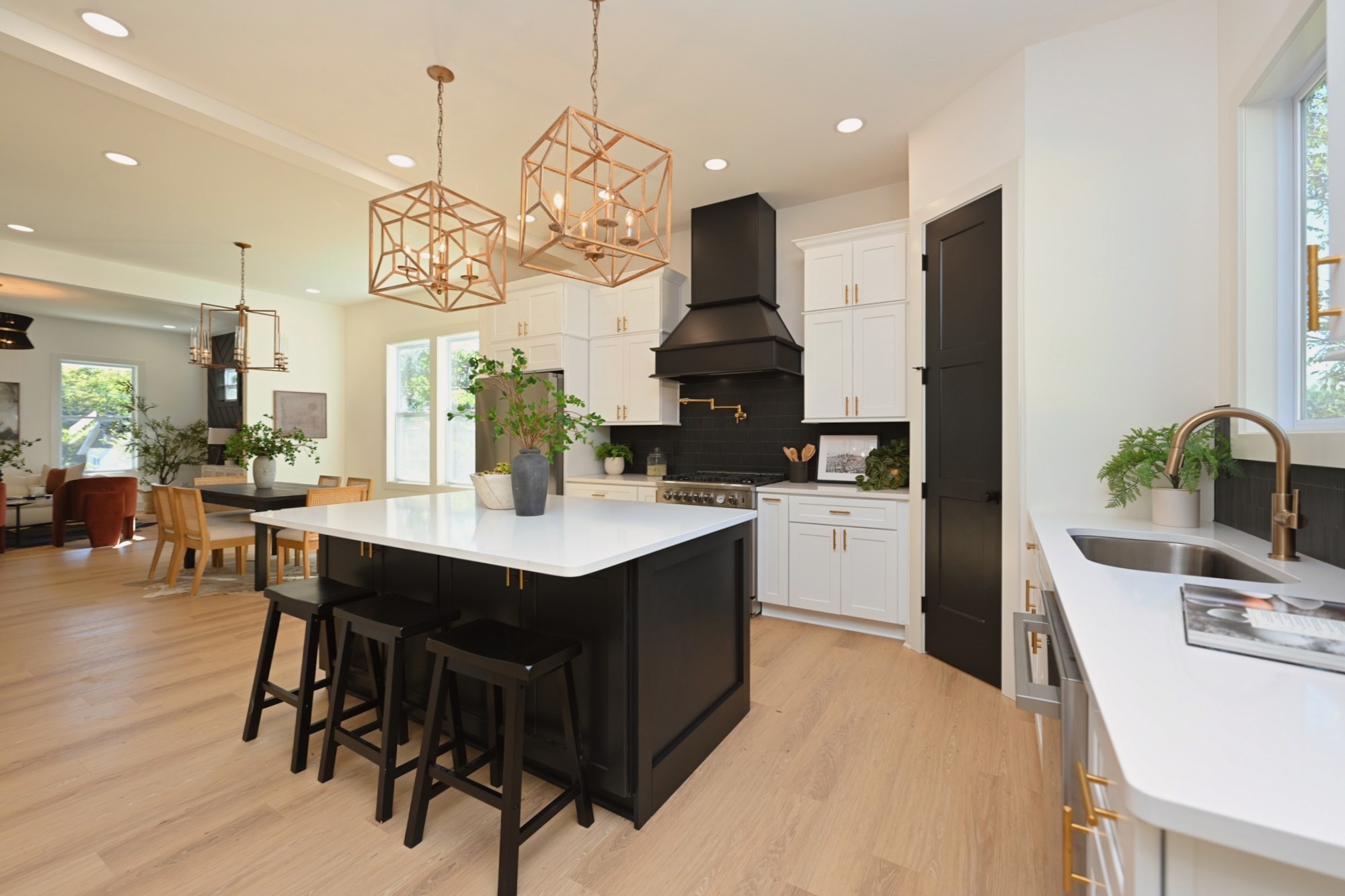 1212 Stockell Street Nashville, TN 37207 - Photo 25 of 86 a kitchen with stainless steel appliances kitchen island granite countertop a table chairs and a stove