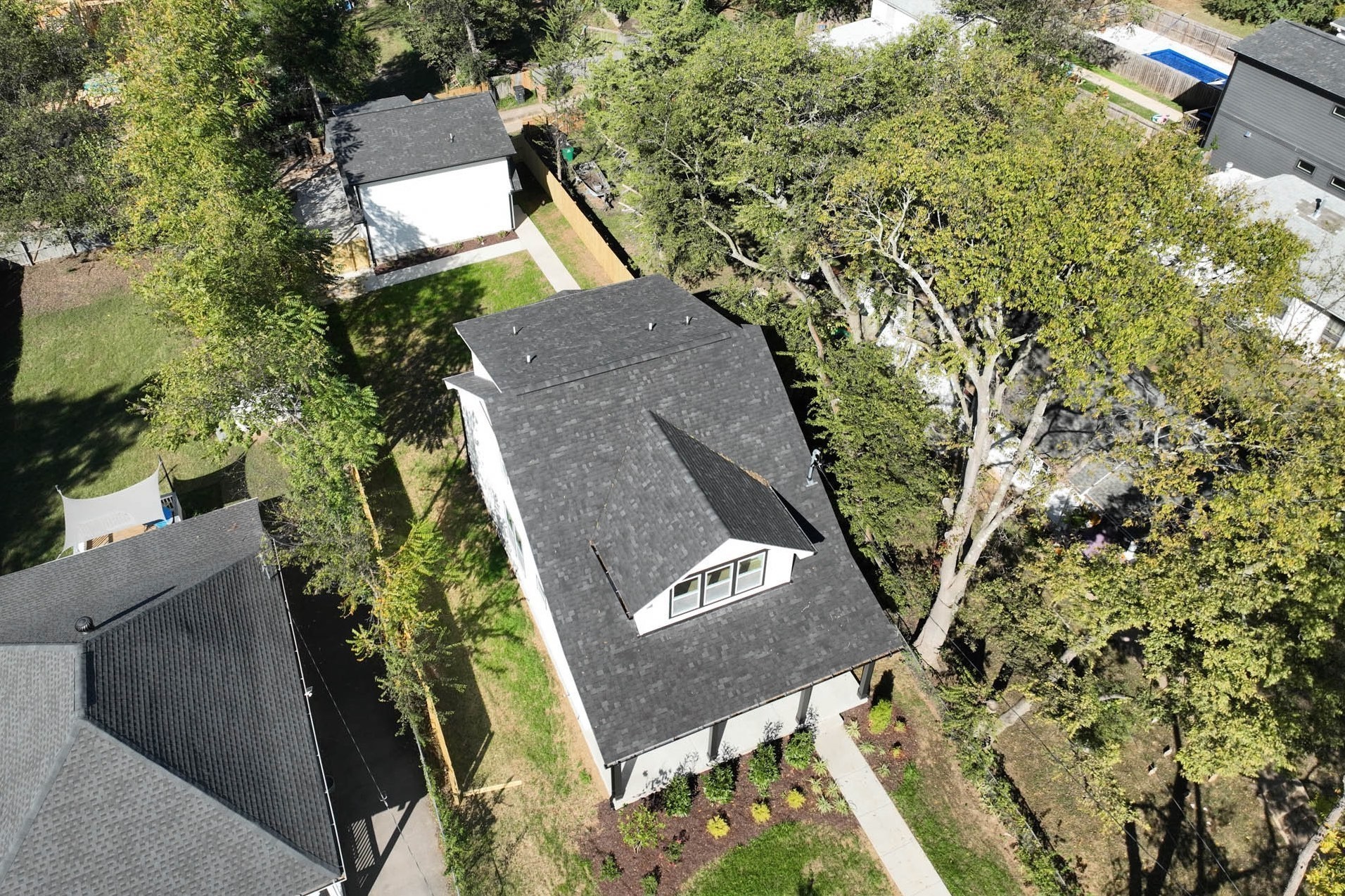1212 Stockell Street Nashville, TN 37207 - Photo 3 of 86 an aerial view of a house with a yard and trees