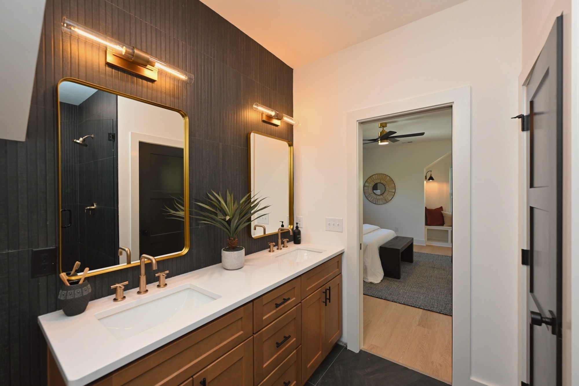 1212 Stockell Street Nashville, TN 37207 - Photo 36 of 86 a en suite bathroom with a sink double vanity and a mirror