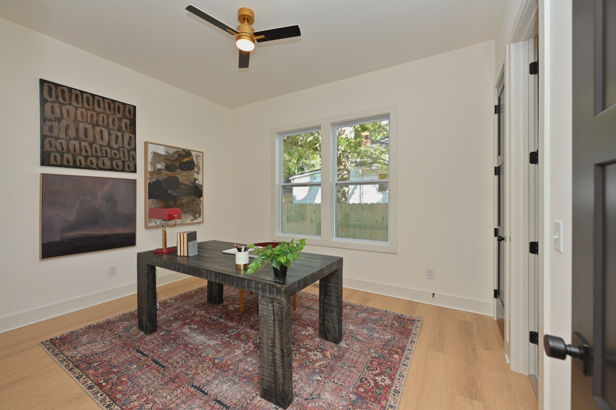 1212 Stockell Street Nashville, TN 37207 - Photo 38 of 86 a view of a workspace with furniture and a window