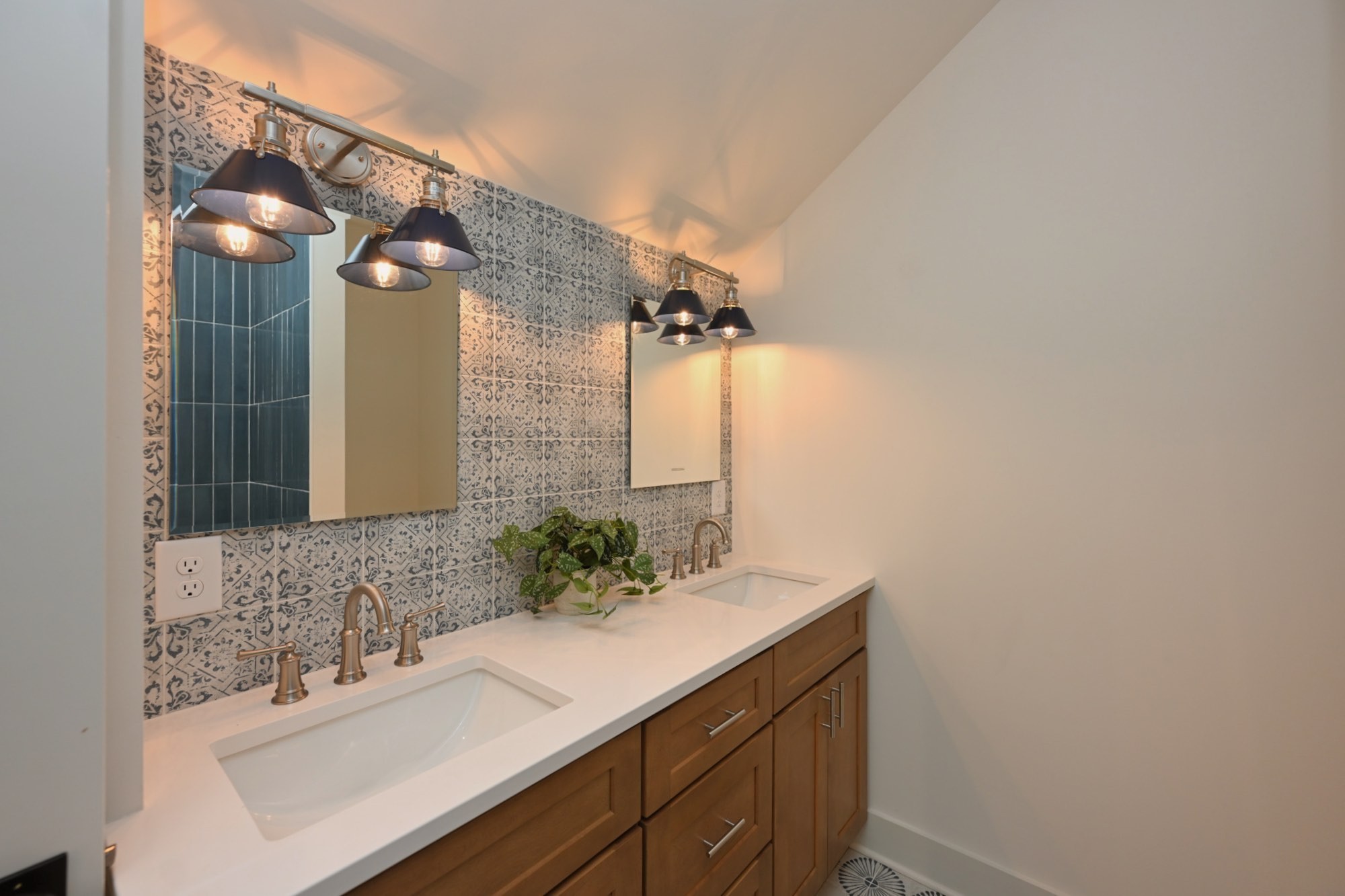 1212 Stockell Street Nashville, TN 37207 - Photo 41 of 86 a bathroom with a sink and a mirror