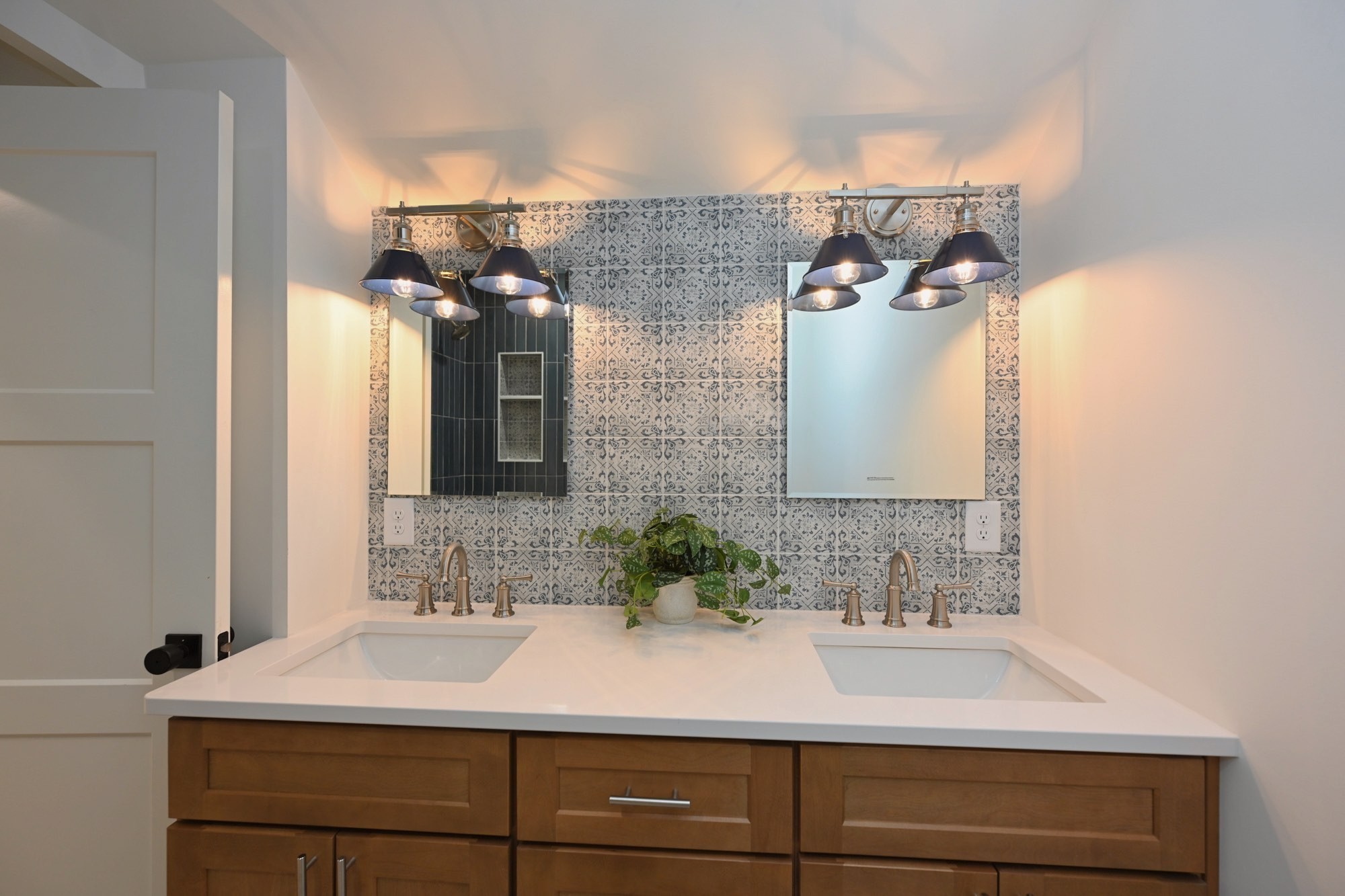 1212 Stockell Street Nashville, TN 37207 - Photo 42 of 86 a bathroom with a sink and mirror