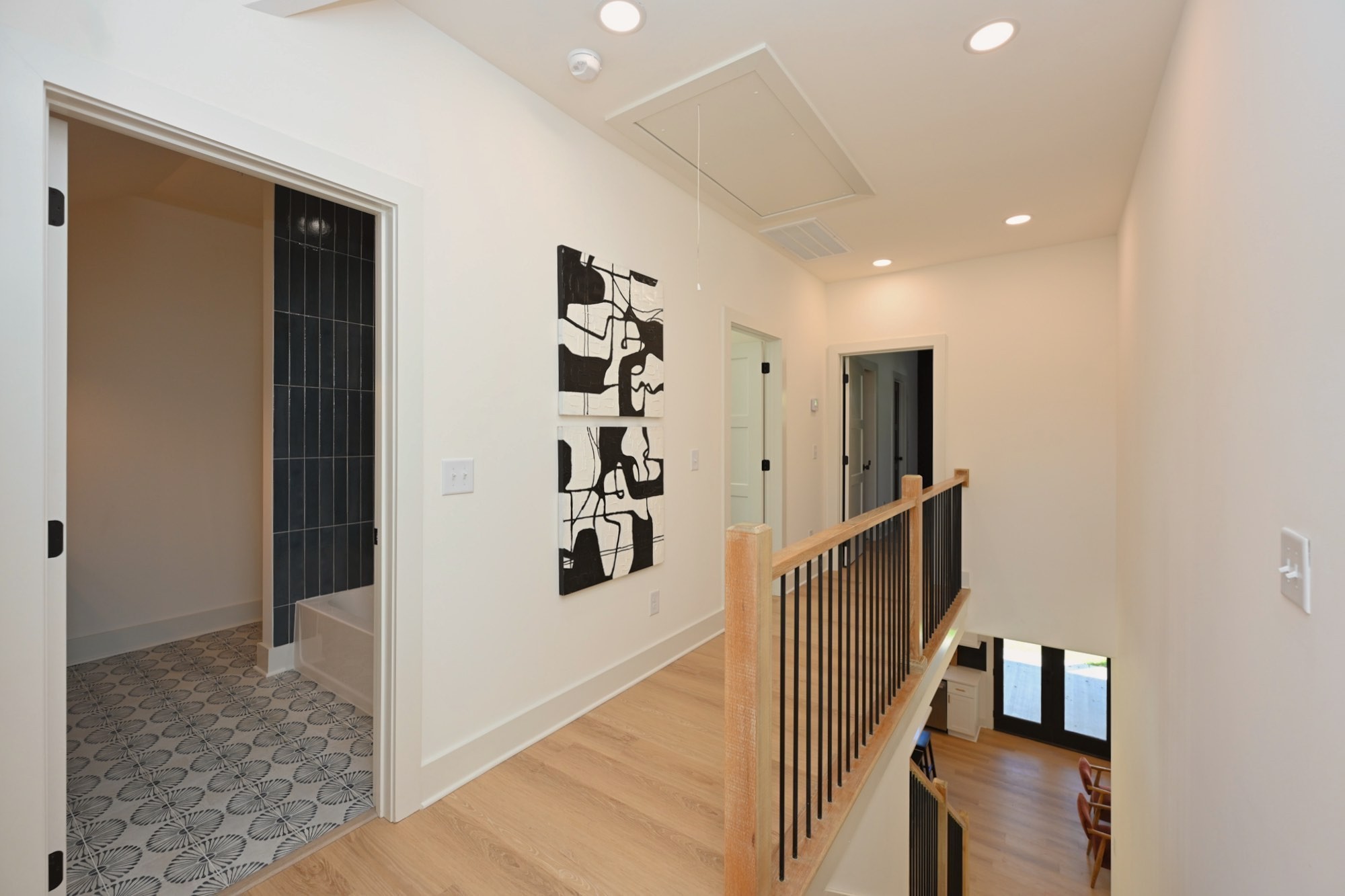 1212 Stockell Street Nashville, TN 37207 - Photo 57 of 86 a view of a hallway with wooden floor and entryway