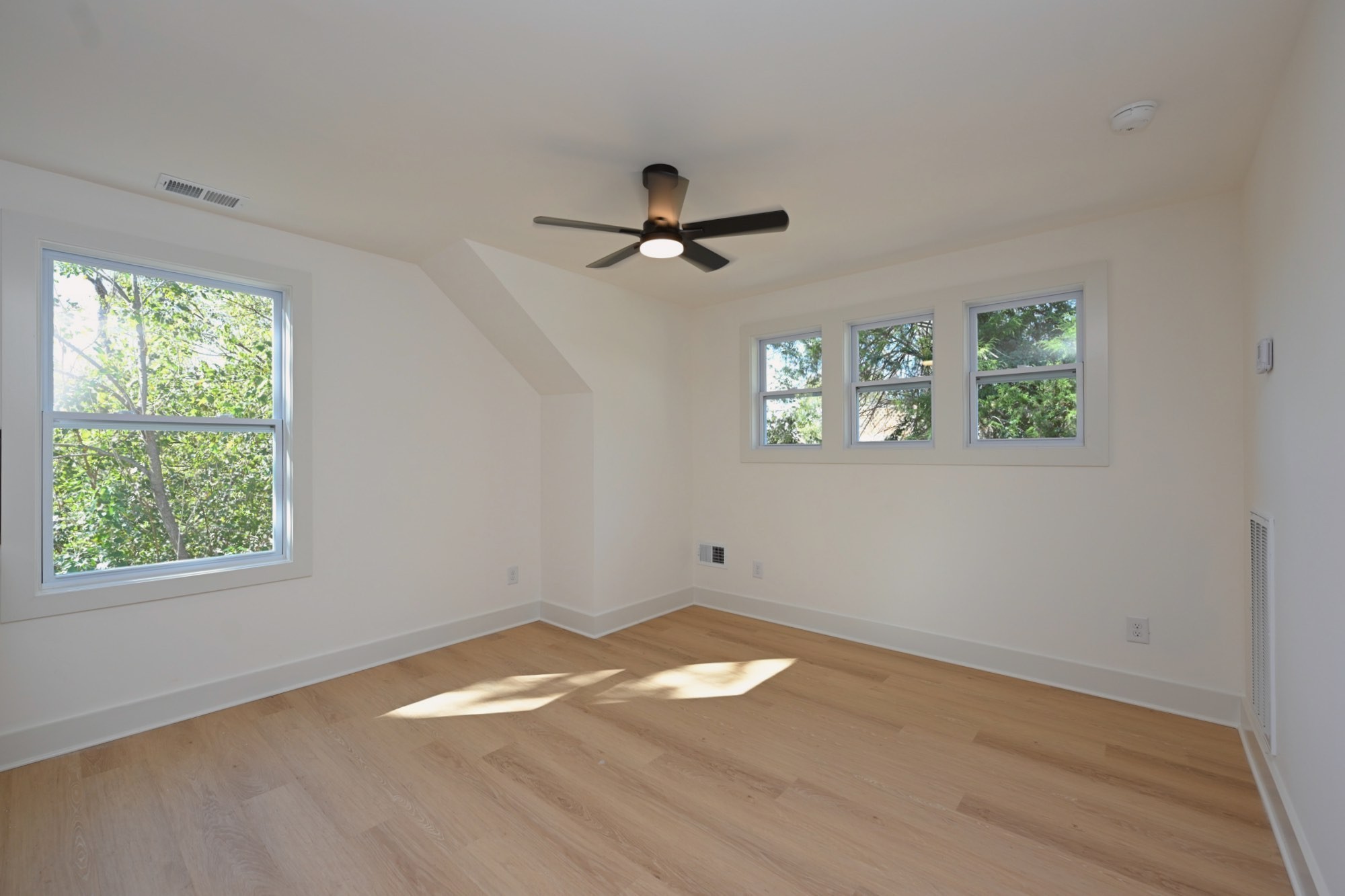 1212 Stockell Street Nashville, TN 37207 - Photo 63 of 86 a view of empty room with wooden floor and fan